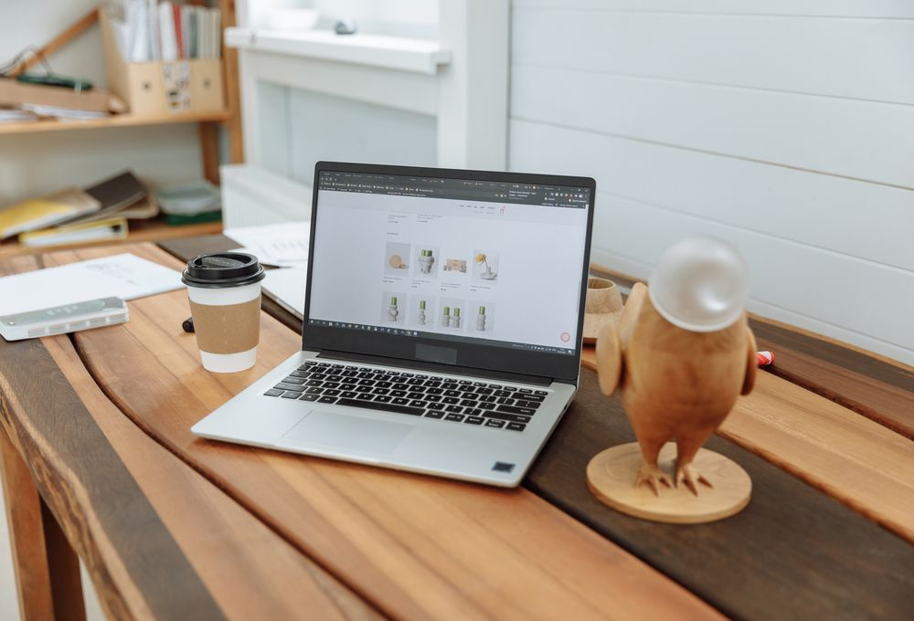 A professional small-business website open on a laptop screen on a desk